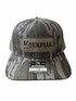 Mossy Oak Bottomland camo trucker hat with mesh back and Kuukpiak Coffee patch